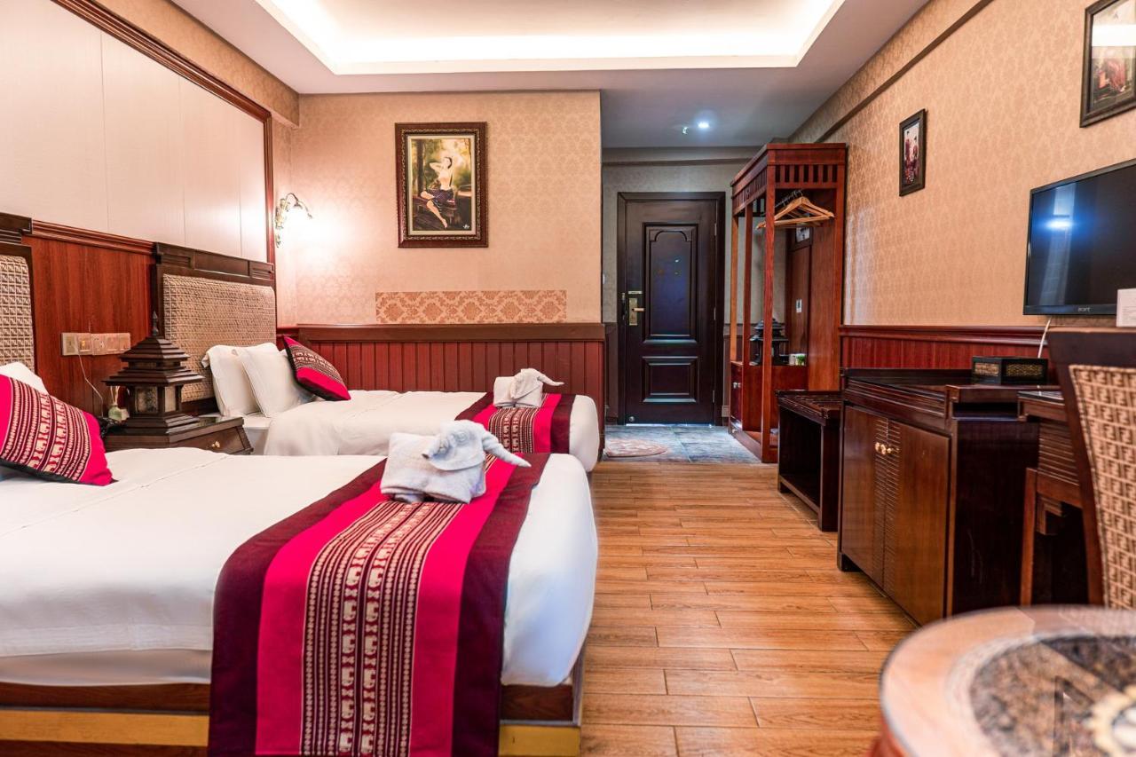 @Siam Hotel Цзинхун Экстерьер фото