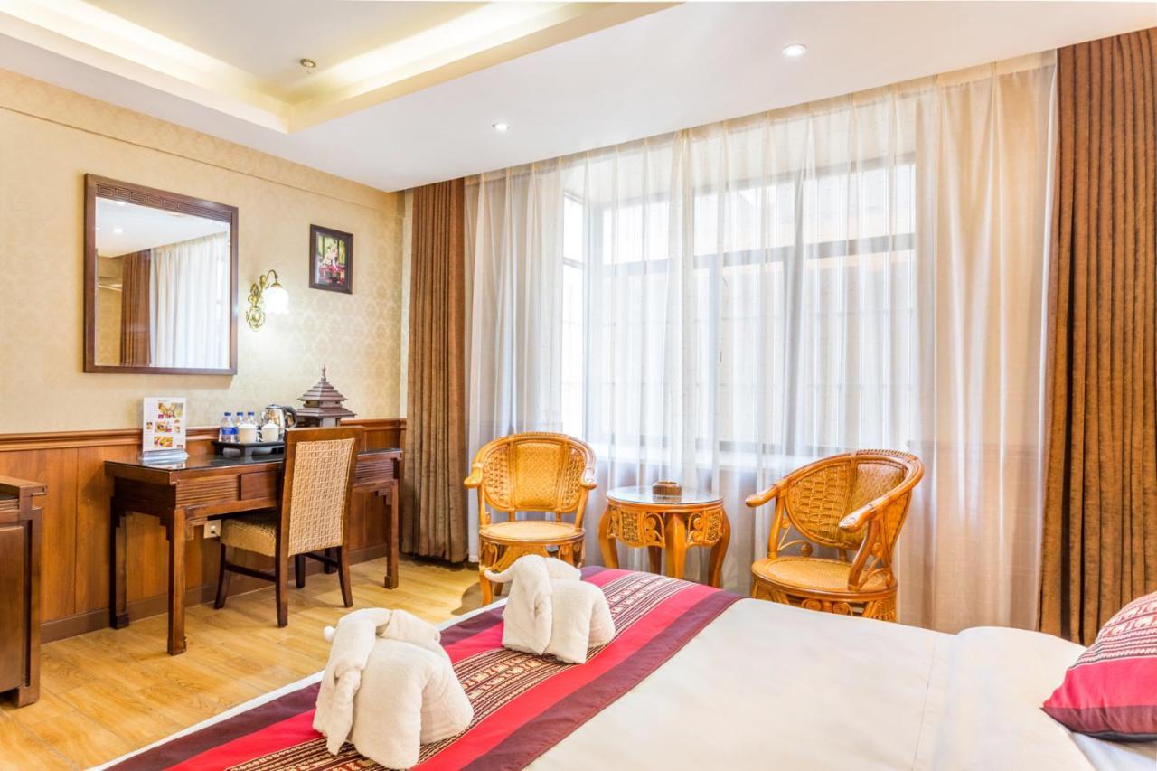 @Siam Hotel Цзинхун Экстерьер фото